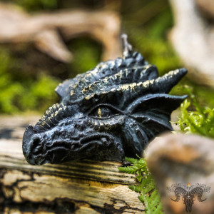 The candle "Dragon Totem" helps to develop magical strength and to get desired
