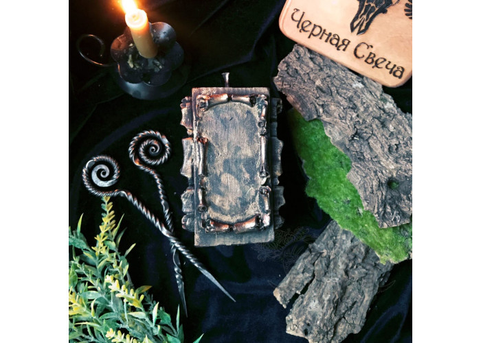 The candle The Scroll of Wishes with a forged awl to make your dreams come real
