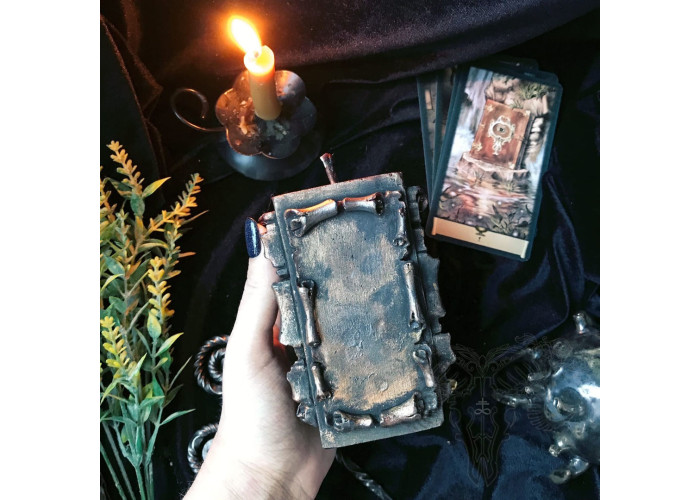 The candle The Scroll of Wishes with a forged awl to make your dreams come real