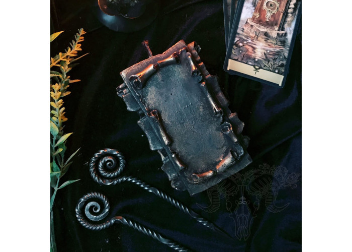 The candle The Scroll of Wishes with a forged awl to make your dreams come real