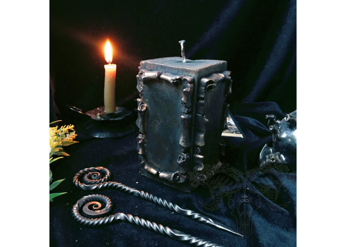 The candle The Scroll of Wishes with a forged awl to make your dreams come real