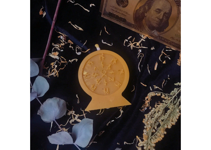 Candle «Wheel of recognition» that attracts customers 