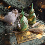 The candle with amulet "Monetary Freedom"