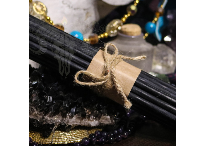 Thin black wax candles