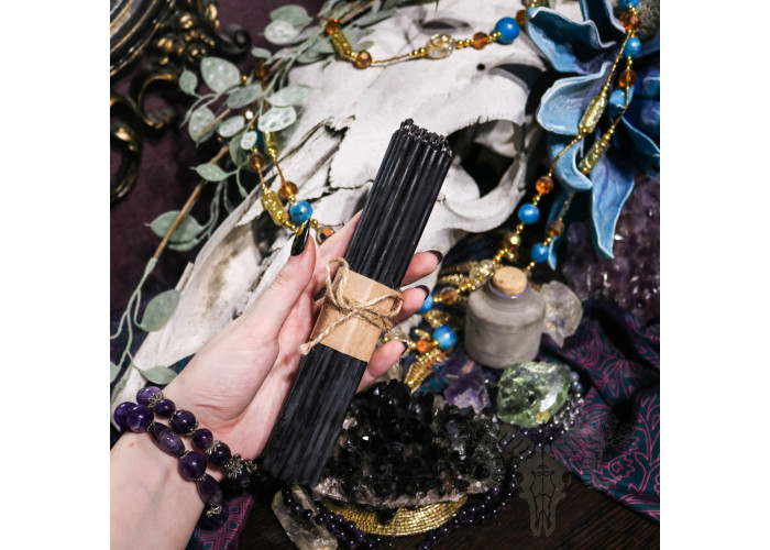 Thin black wax candles