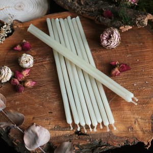 Thin white wax candles